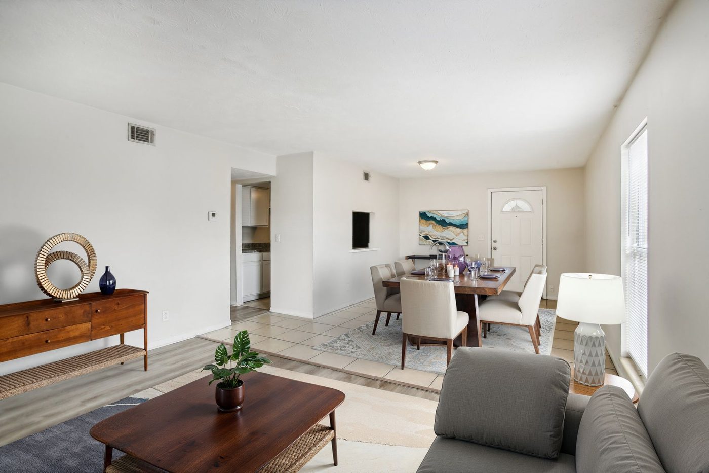 Open living and dining area in a renovated Grand Oaks apartment