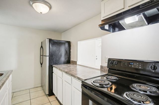 Renovated kitchen with granite counters